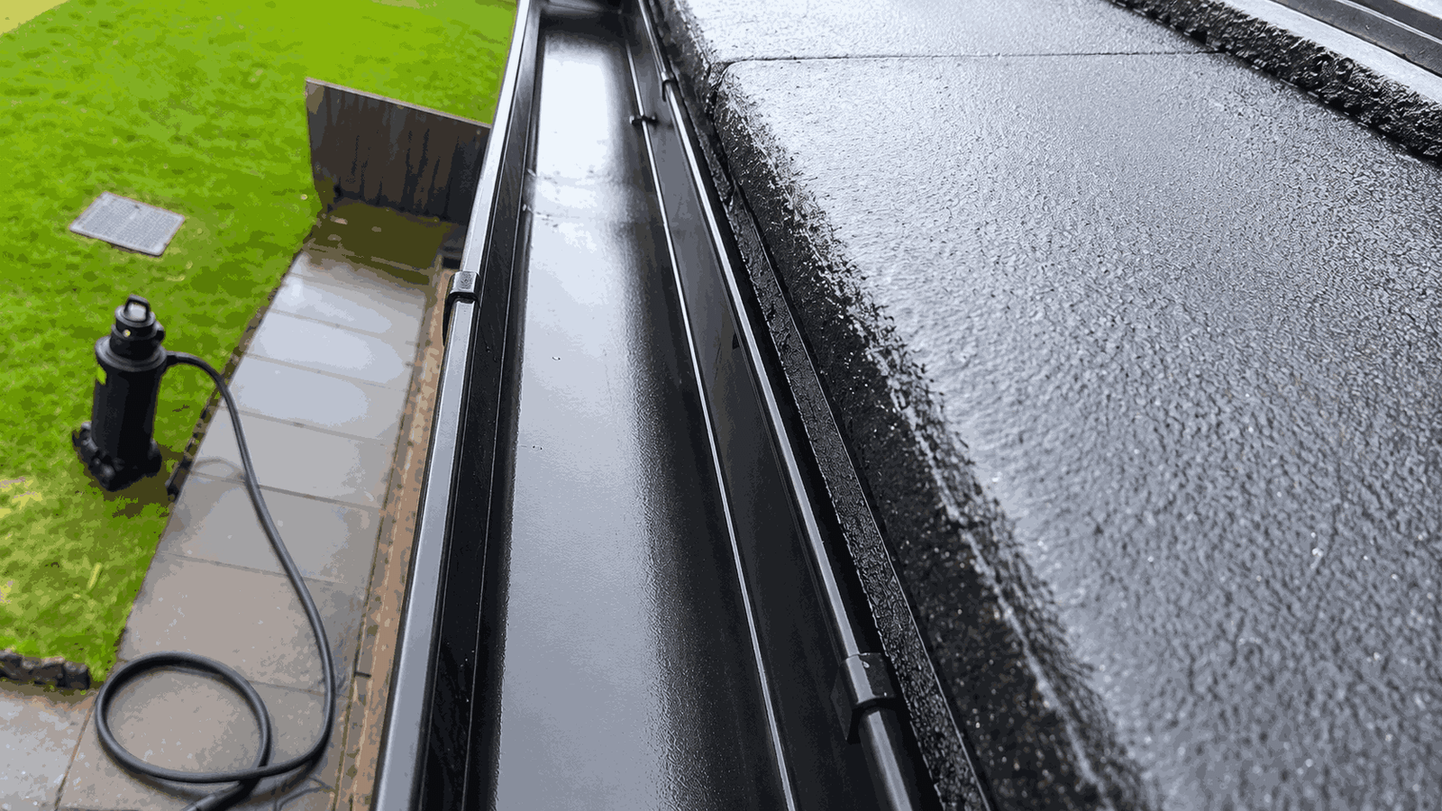 After professional gutter clearance - clean, perfectly pitched gutter ready for maximum rainfall